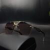 PXL_20251029_142358851.PORTRAIT-scaled Dita Luxury Rimless Sunglasses – Gold Frame Brown Gradient