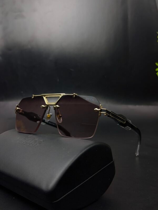 PXL_20251029_142358851.PORTRAIT-scaled Dita Luxury Rimless Sunglasses – Gold Frame Brown Gradient
