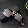 PXL_20251029_142440783.PORTRAIT-scaled Dita Luxury Rimless Sunglasses – Gold Frame Brown Gradient