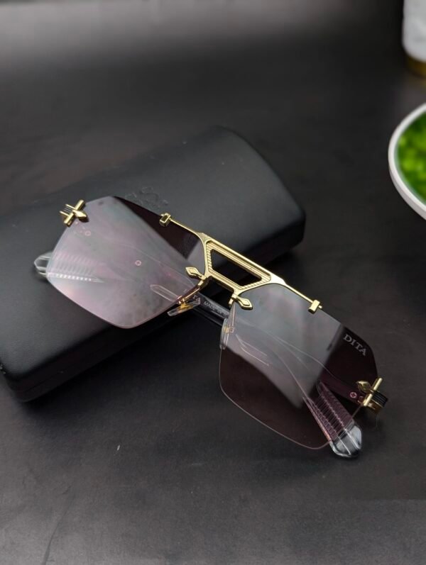 PXL_20251029_142440783.PORTRAIT-scaled Dita Luxury Rimless Sunglasses – Gold Frame Brown Gradient